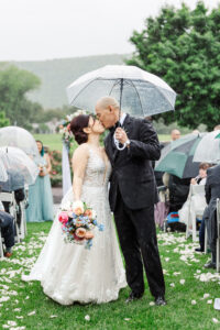 Evergreen Country Club wedding with rain during ceremony
